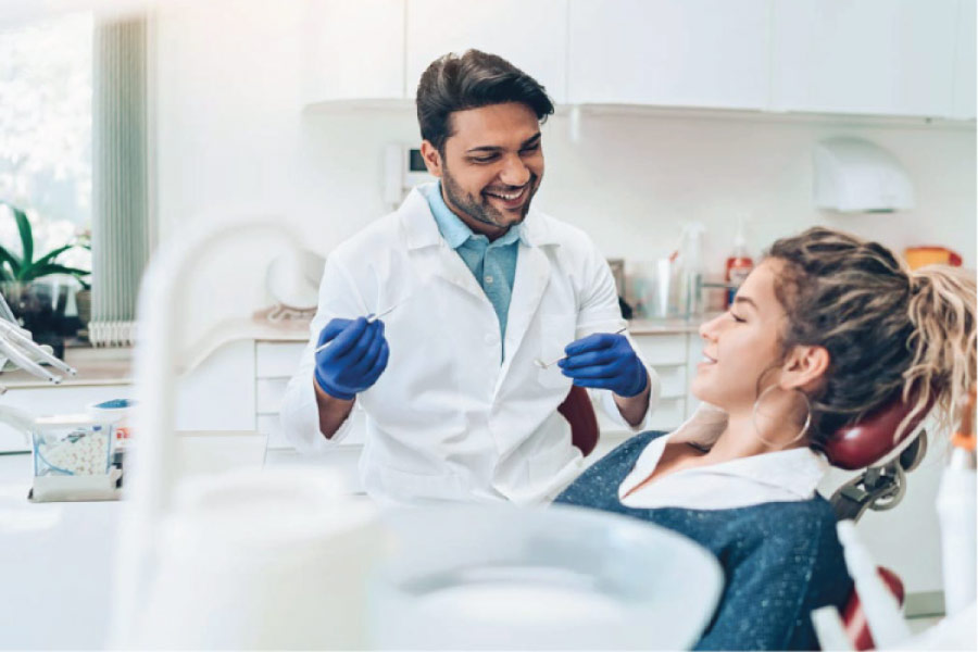 young woman gets dental screenings for preventative care.